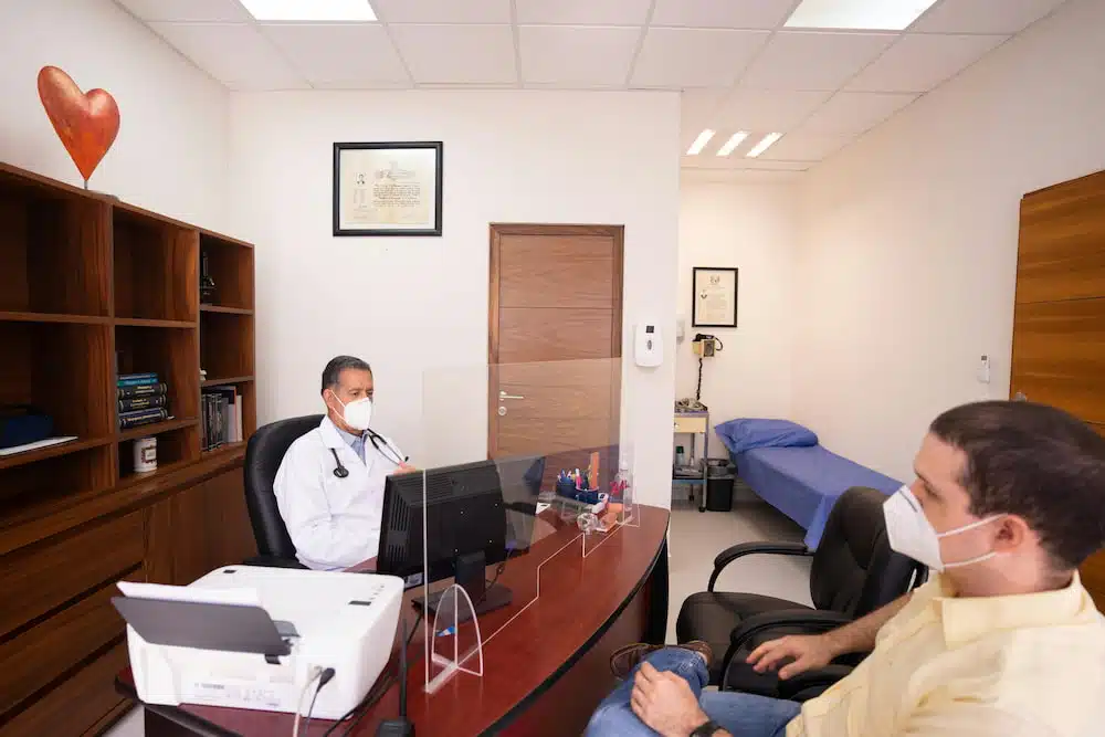 Patient having a consultation in a chiropractic clinic