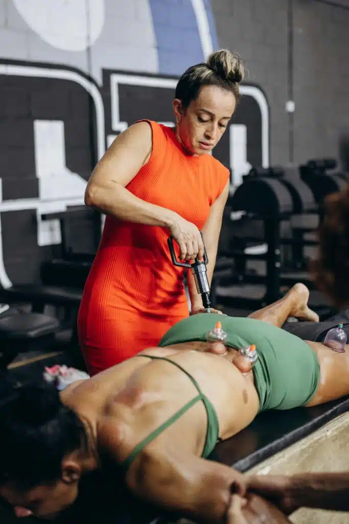 A woman is doing a massage on a man
